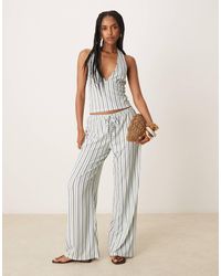 ASOS - Pantalon d'ensemble ample et texturé à taille mi-haute et fines rayures - ivoire - Lyst