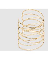 Stradivarius - Bracelet jonc croisé - doré - Lyst