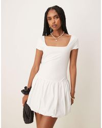 Mango - Robe courte à ourlet boule, encolure carrée et manches courtes - Lyst