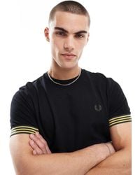 Fred Perry - Camiseta Negra Holgada Con Rayas En Las Bocamangas De - Lyst