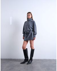 TOPSHOP - Robe courte cintrée à la taille en daim véritable avec col montant et manches longues - pétrole - Lyst