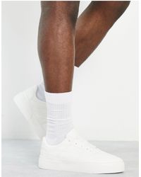 ASOS - Sneakers bianche con suola spessa - Lyst