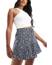 ONLY - Falda Pantalón Azul Marino Con Cintura Elástica Y Estampado De Florecitas De - Lyst