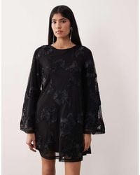 Gina Tricot - Long Wide Sleeve Sleeve Flowy Mini Dress With Open Back - Lyst