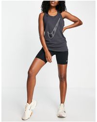 Nike - Camiseta negra sin mangas con logo con estampado - Lyst