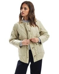 Vero Moda - Giacca Corta Trapuntata A Cipolla Color Crema Con Tasche - Lyst
