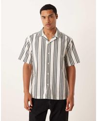 ASOS - Camicia Comoda E Nera A Righe Con Rever - Lyst