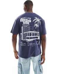 Hollister - T-shirt avec motif au dos - bleu marine - Lyst