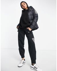 Veste en fausse fourrure avec logo trfle dans le dos Synthétique adidas  Originals en coloris Noir | Lyst