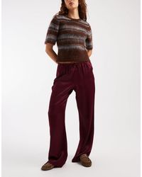 ASOS - Pantalon ample à enfiler en satin - prune - Lyst