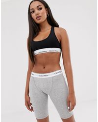 Calvin Klein – Kurze, moderne Baumwoll-Leggings - Grau