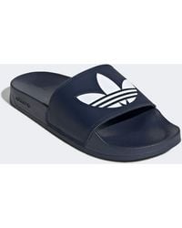 adidas Originals Flip-flops and slides for Women - Up to 25% off at Lyst.com