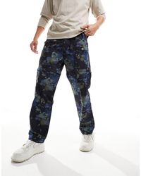 Levi's - Pantalones s cargo con bolsillos y diseño estampado - Lyst