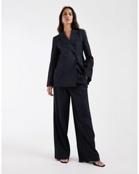 Aware - Pleat Front Tailored Wide Leg Pants - Lyst