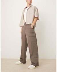 ASOS - Pantalones De Vestir Caquis De Pernera Ancha Con Cinturilla Elástica, Bolsillos Cargo Y Pinzas Dobles De -Verde - Lyst