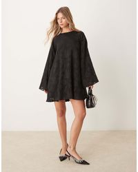 Gina Tricot - Jacquard Sheer Mini Swing Dress With Satin Bow Back Detail - Lyst
