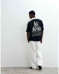 ASOS - Polo oversize à imprimé bob marley - Lyst