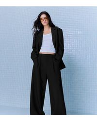 Bershka - Petite Voluminous Trousers With Double Fabric - Lyst