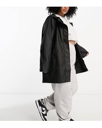 Vero Moda - Rubberised Hooded Raincoat - Lyst