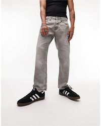 TOPMAN - Jeans comodi lavaggio grigio scuro tinto - Lyst
