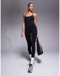 Bo&Tee - Open Back Strappy Unitard - Lyst