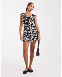 New Look - – kurzes freizeitkleid aus netzstoff mit kuhfleckenmuster - Lyst