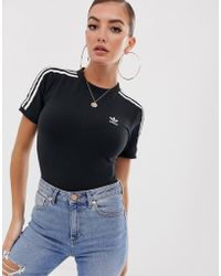 Kurzärmliger Body in Schwarz mit den drei Streifen Kurzärmliger Body in Schwarz mit den drei Streifen