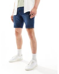 ASOS - Pantaloncini di jeans skinny lunghezza standard tinto - Lyst