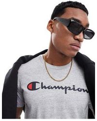 Champion - T-shirt grigia con logo sul petto - Lyst