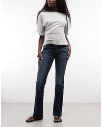 Weekday - Luna Low Waist Skinny Flare Jeans - Lyst