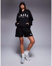 Kaiia - Short d'ensemble molletonné à logo brodé - Lyst