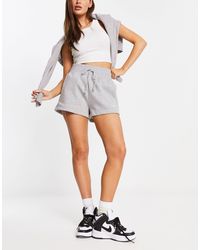Nike - Mini Swoosh Shorts - Lyst