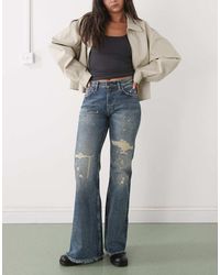 Weekday - Helix Low Waist Loose Fit Flare Leg Jeans With Distressed Detail - Lyst
