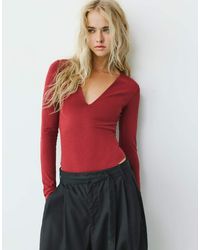 Pull&Bear - V-Neck Bodysuit - Lyst