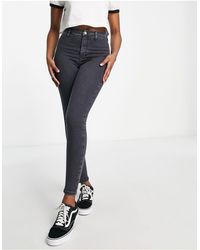 TOPSHOP Joni Jeans for Women - Up to 70% off | Lyst
