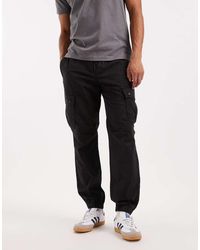River Island - Pantaloni Cargo Regular Fit Neri - Lyst