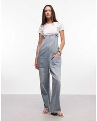 Monki - Denim Jumpsuit Met Wijde Pijpen - Lyst