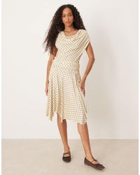 ASOS - Falda Midi Color Crema Con Bajo Con Vuelo Y Estampado De Lunares De -Blanco - Lyst