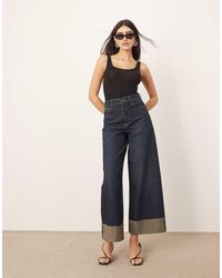 ARRANGE - Vaqueros Azul Añil De Talle Alto Y Corte Holgado Con Dobladillos Vueltos Parker De - Lyst