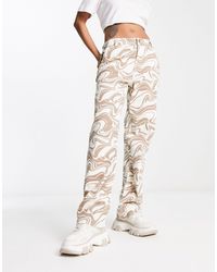 Hollister - Pantaloni dad fit a vita alta color crema con stampa effetto marmo - Lyst