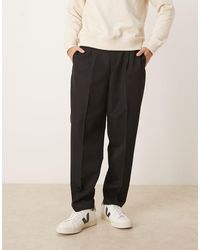 ASOS - Smart Pleated Relaxed Tapered Pants And Elasticated Waistband - Lyst