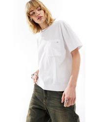 Lee Jeans - T-shirt bianca con logo sulla tasca - Lyst