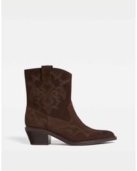 Stradivarius - – cowboy-ankle-boots aus spaltleder - Lyst