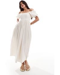 In The Style - Linen Look Bardot Puff Sleeve Maxi Dress - Lyst