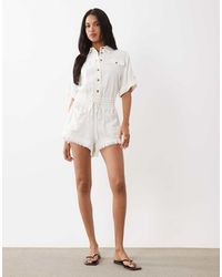 Noughts & Kisses - Cotton Rich Dropped Shoulder Frayed Shorts Detailing Romper - Lyst
