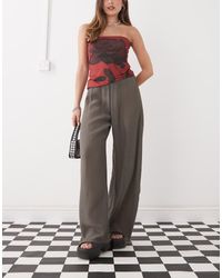 Weekday - Pantaloni Ampi Plissé Color Talpa Scuro - Lyst