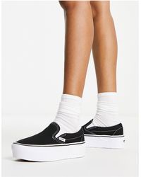 Vans - Sneakers senza lacci nere e bianche con suola rialzata - Lyst