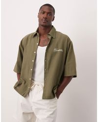 ASOS - Chemise oversize à manches courtes aspect lin avec broderie sur la poitrine - kaki - Lyst