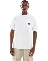 The North Face - Camiseta Blanca Con Logo De Montaña En El Bolsillo En El Pecho De -Blanco - Lyst