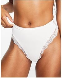 DORINA - High Waist Medium Control Contour Shaping Thong With Lace Detail - Lyst